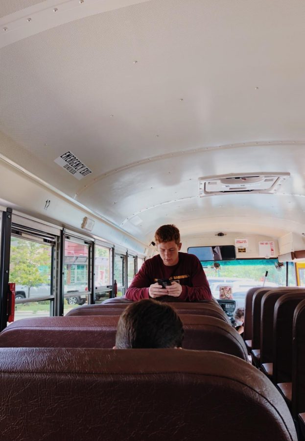 Senior Michael Rivera works with JEE Foods while on the cross country bus.