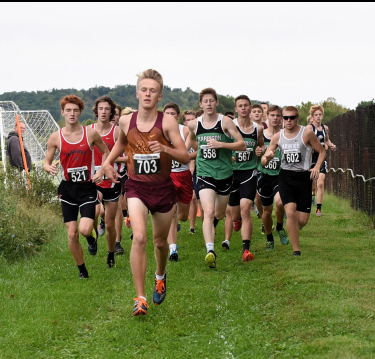 Steven Knebel leads the pack at the Harrison Invitational. Picture credit to Geoff Blankenship of the Enquirer.