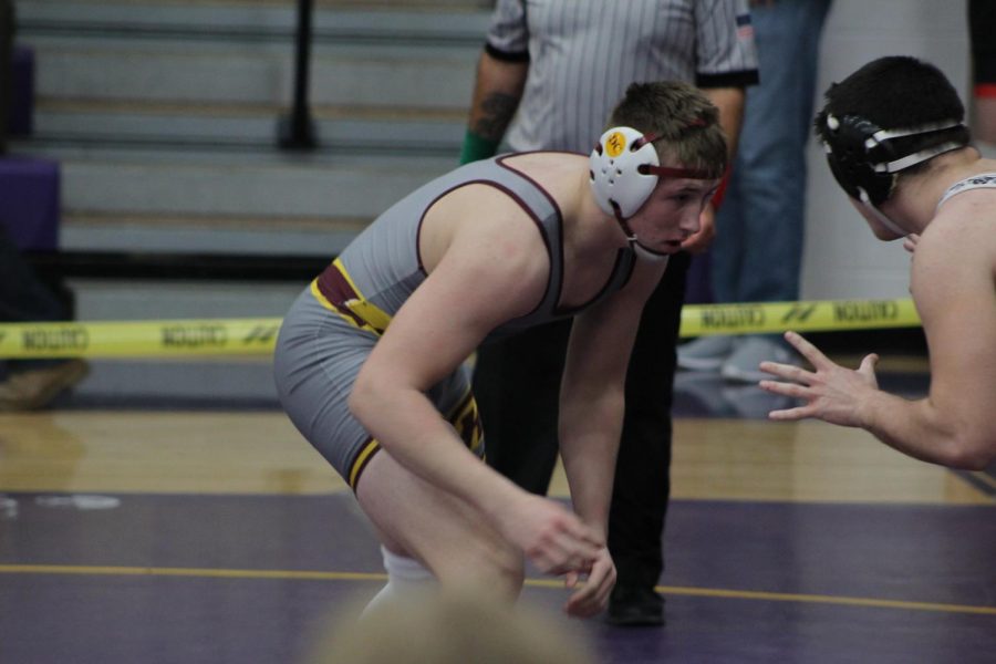 Logan Iams faces his Franklin opponent at the Eaton Invitational.