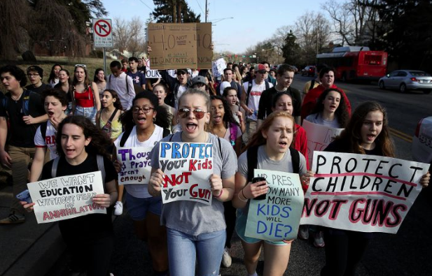 Protesters participate in a gun rally. Image sourced from Huffpost.com