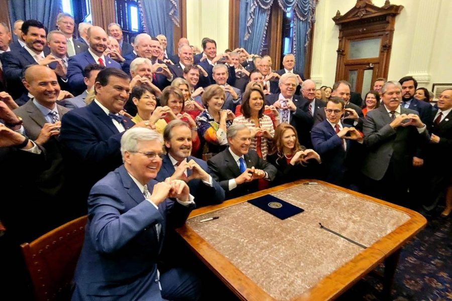 Lawmakers in Texas signing the Heartbeat Act into law. Photo credit: Bryan Hughes Twitter