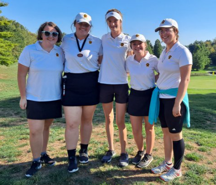 The girls varsity golf team poses after coming second in SWOC and setting an all-time low team score of 18 holes. 