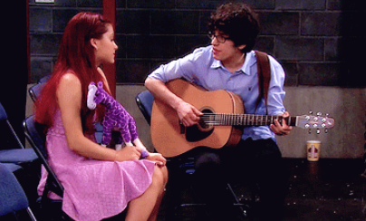 Actor Matt Bennett singing actress Ariana Grande a heartfelt song on the set of Victorious.