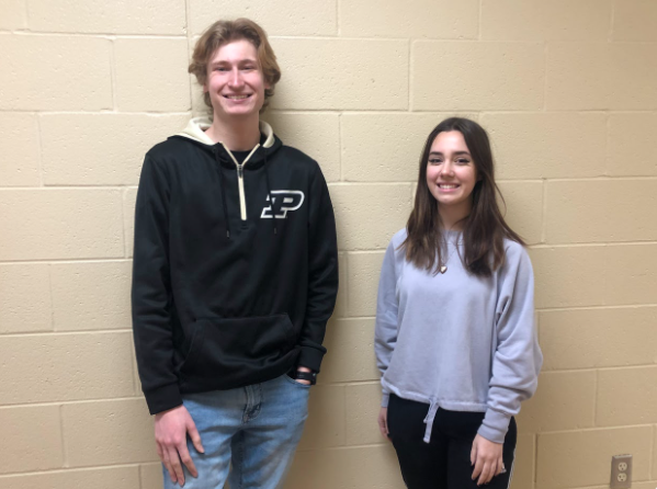 Juniors, Alli Gassman and Gus LaValle rep their jackets and sweaters, showing off chilly weather fashion styles.