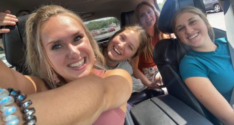 Seniors Payton Jones and Lexie Gibbons, alongside sophomores Olivia Gibbons and Callie Jones pose for a selfie in the car after the first day of school.