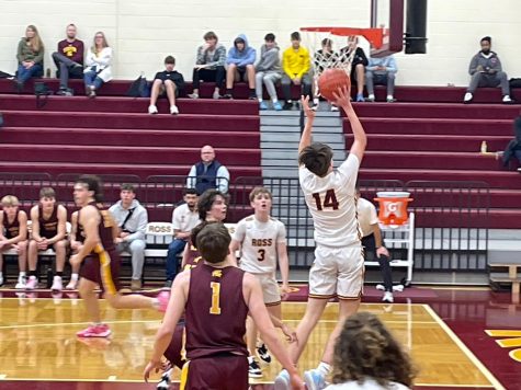 Senior Luke Fulmer shoots a layup in Ross’ first game of the season against the Turpin Spartans.