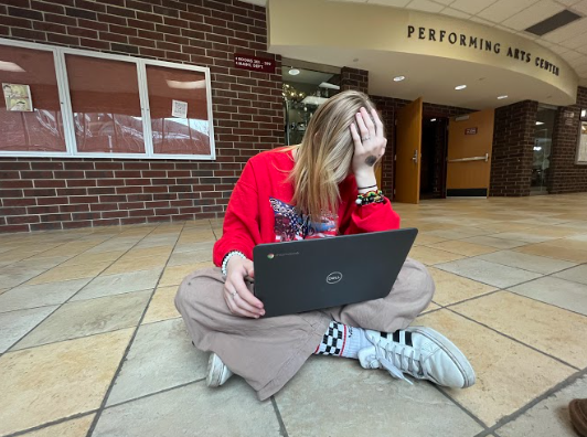 Freshman, Shelby Bacher stressing out while working on homework.