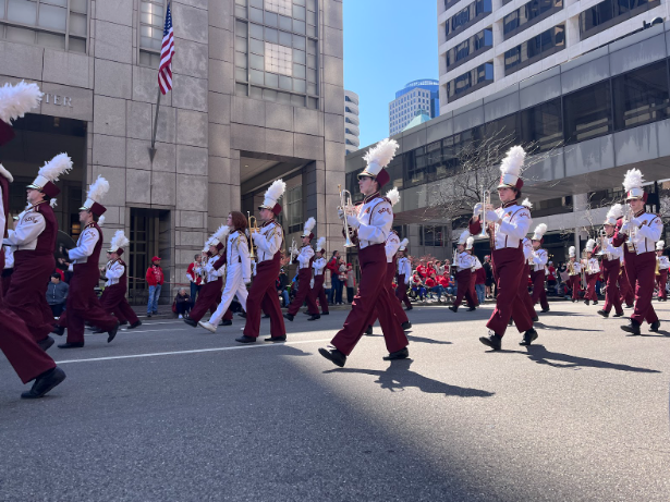 Ross+High+School%E2%80%99s+Band+of+Class+marching+their+way+through+the+city+of+Cincinnati%2C+Ohio+to+perform+for+the+Reds+Opening+Day+Parade.