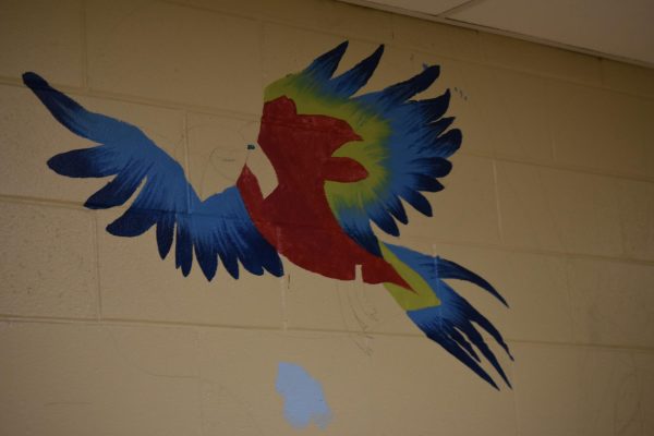 Picture of new mural getting painted at Ross High School.