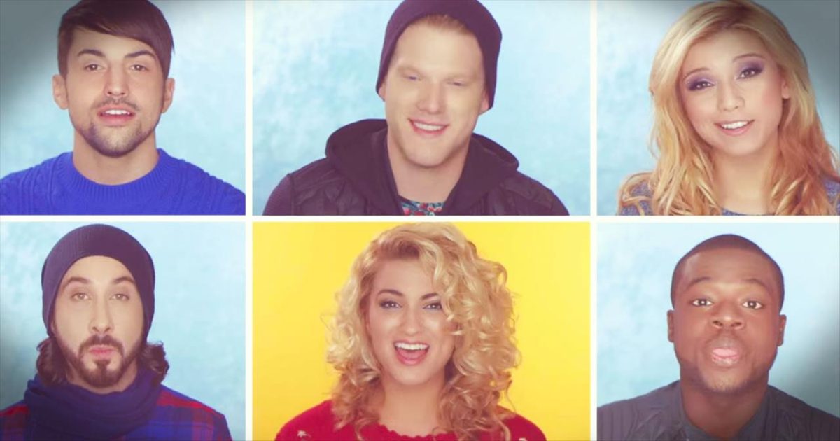 A snapshot of the music video "Winter Wonderland / Don't Worry Be Happy" with the Pentatonix and Tori Kelly.